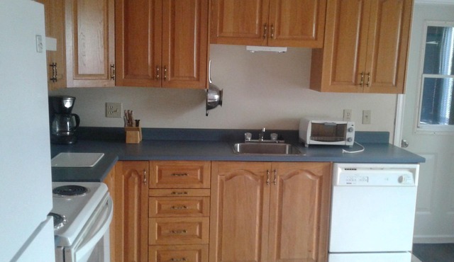!/2 of ranch style all one level house with attached garage. Open concept .