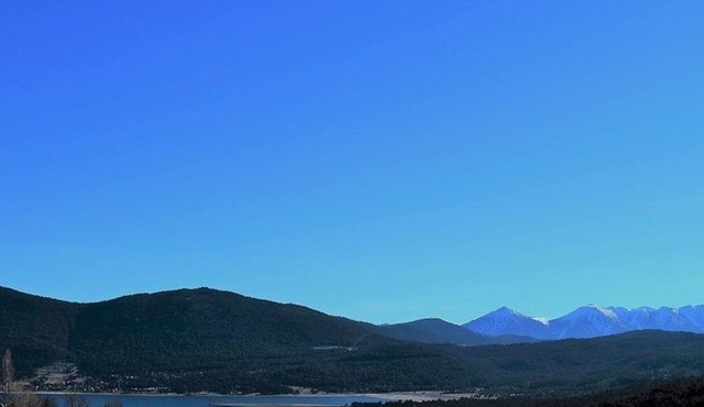 2-room apartment with south-facing balcony and private parking