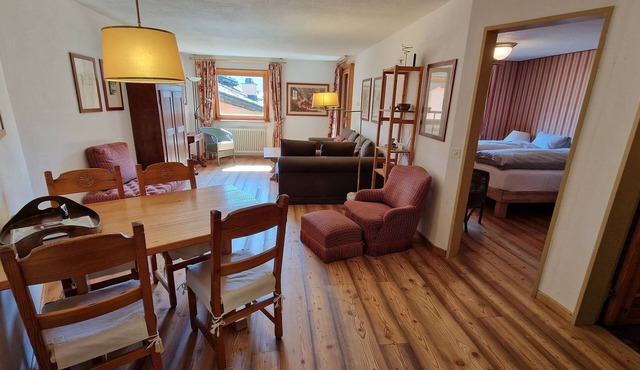 2-room flat, height underground parking, cosy living room with sheltered balcony