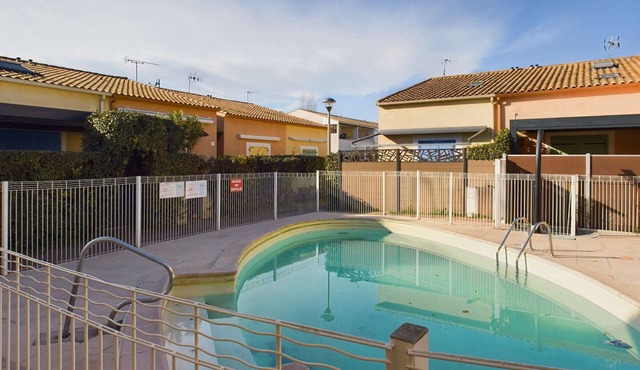 2-Room Ground Floor Apartment with Terrace and Parking in Secure Residence with Pool