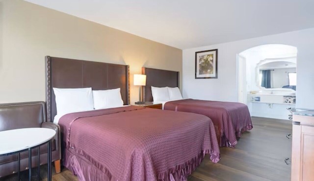 2 Rooms for Great Value: 2 Full Beds Non-Smoking for 4 Guests.