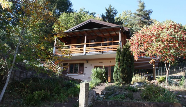 2-star chalet in a green setting with a view of the Romanesque Abbey