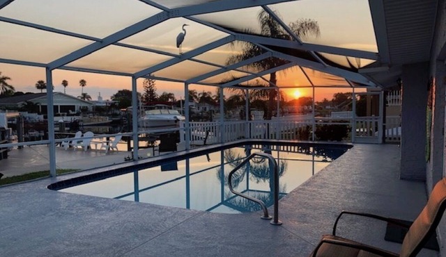 2019 Lowe Pontoon, Mercury 115. Heated, caged, salt water pool on canal. Pets ok