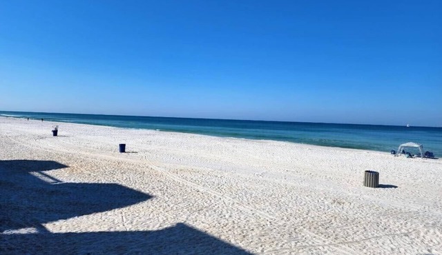 2022 Renovation! Surf side and stones throw from the beach!