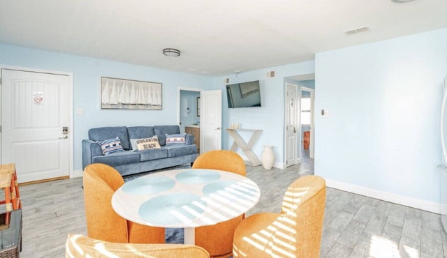 223 10th St N- Unit 5 · Steps to Sand. Updated Bouchee Beachy Condo☆Deck☆Parking