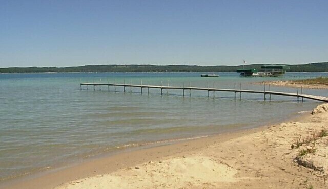250 feet of sandy beach on Lake Charlevoix