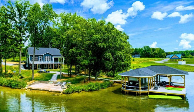 250’ of Lakefront with Boat House & Private Beach