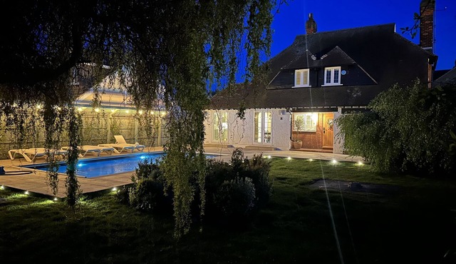 250m from the beach with a private heated pool!