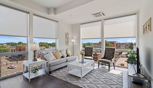 2BR City Loft Sweeping Glass Views