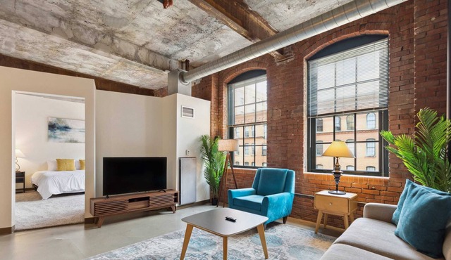 2BR Historic Loft Retreat With Pool & Gym