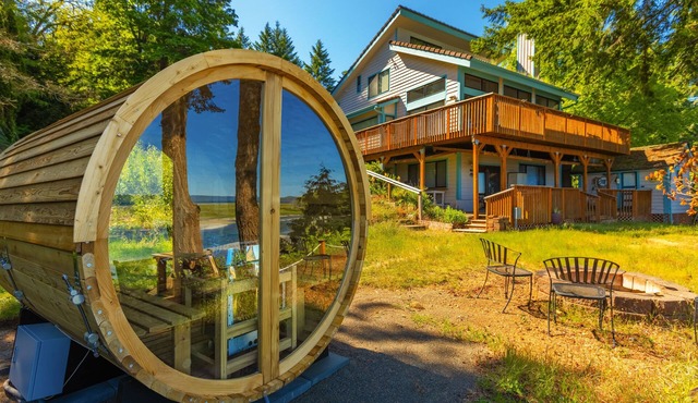 2BR waterfront home with beach access and views.