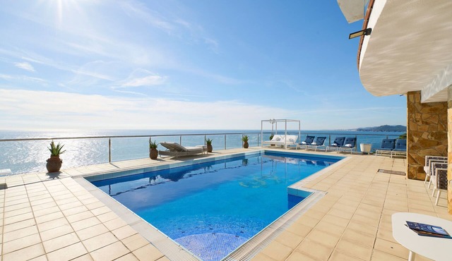 2CANY01 - Spectacular luxury house with private outdoor and indoor pool, located in a privileged area on the cliff of Cala Canyelles with magnificent views of the sea
