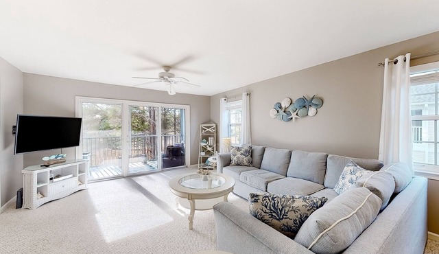 2nd-floor condo at Bethany Bay with pool, on-site golf, and sports courts