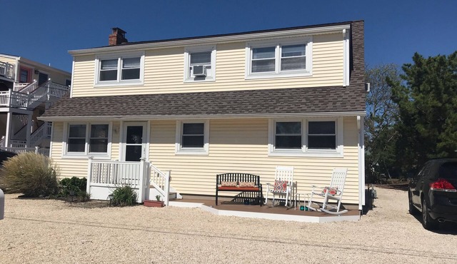 2nd floor of duplex. Bay view, sunsets, beach, activities. Great family getaway!