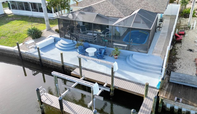 3 Bed 2 Bath on Deep Canal 5 minutes to channel CLEAN & NICE. New boat hoist