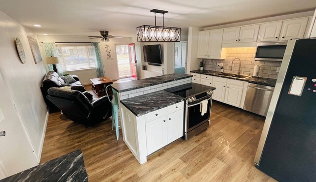 3 bedroom 1.5 bath house. Walkable to BSU and many restaurants, ping pong table