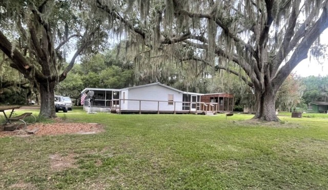 3 bedroom, 2 bath on Lake Kissimmee canal with boat dock and trailer parking.
