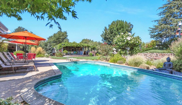 3 bedroom, 2 bath, pool, new hot tub, outdoor kitchen, bar and lounge, fire pit