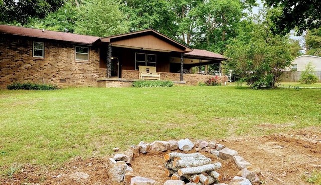 3 bedroom 2 bath ranch style house on 5 acres.