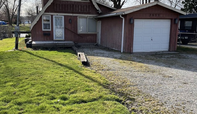 3 bedroom 2 bath renovated A frame on channel to Kuhn lake and the Barbee Chain