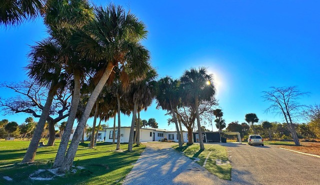 3 Bedroom 3 Bath a waterfront 3 Acre Home close to Downtown and Beaches.