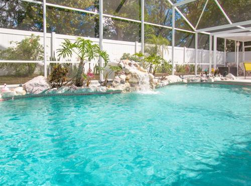 3 Bedroom Home With Private Screened Pool With Rock Waterfall Feature And Gameroom By Florida Dream Homes
