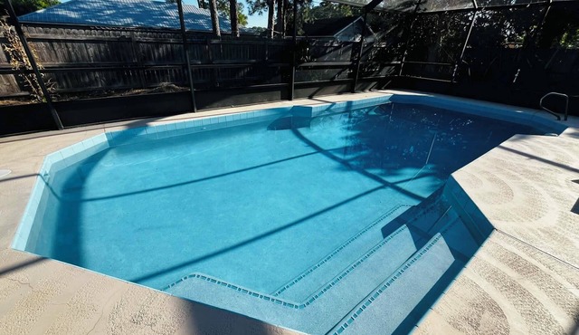 3-bedroom house in peaceful Cocoa with cool AC and pretty poolside views
