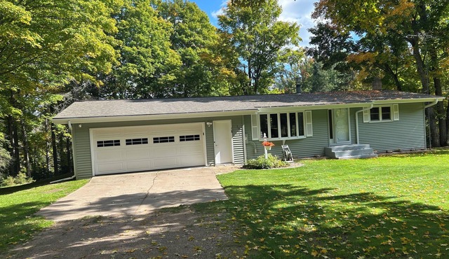 3-bedroom house located three miles from Sawyer Lake on the Michigamme River