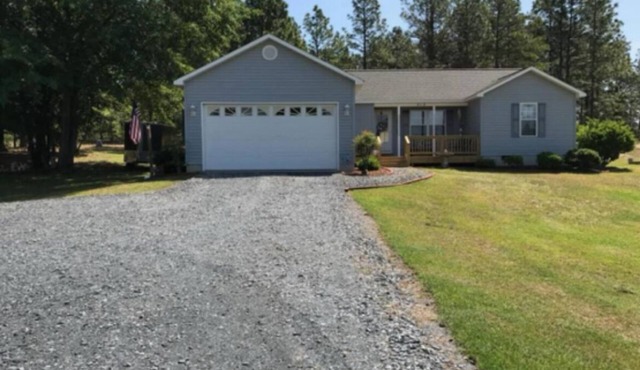 3-bedroom house in charming Jackson Springs. Not to far from the course.