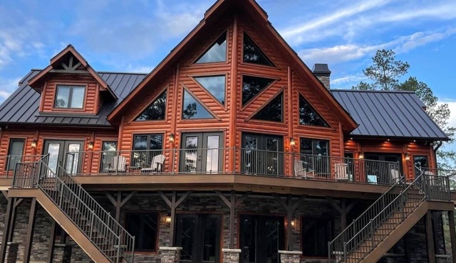 3-bedroom log cabin just steps from Lake Rhodhiss with private boat dock.