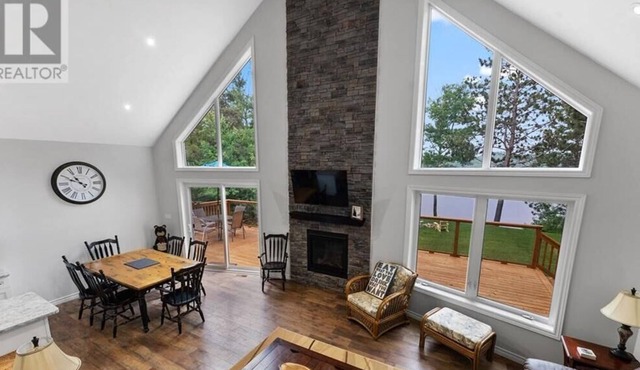 3 bedroom open concept Lake front house with shallow entry, sandy bottom beach