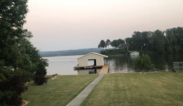 3 bedrooms, 2.5 bath Lakefront home, deep water, enclosed boathouse, close ramp
