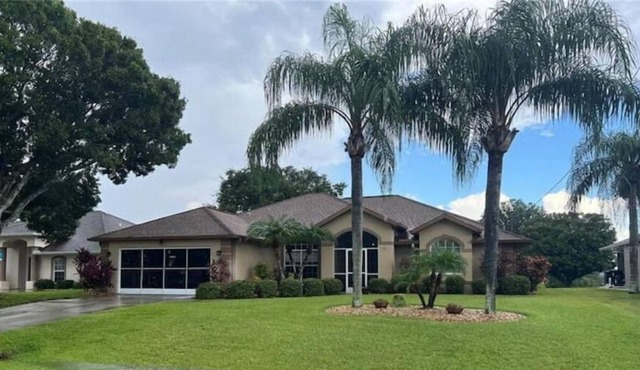 3 beds, 2 bath, Waterfront home in Rotonda West, FL. w/heated pool.