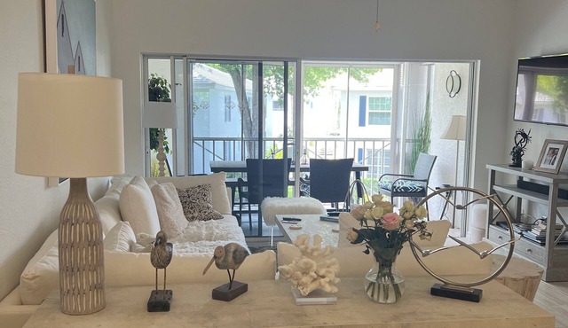 3 BR coach house at The Barrington Club in Pelican Bay. Private beach access.