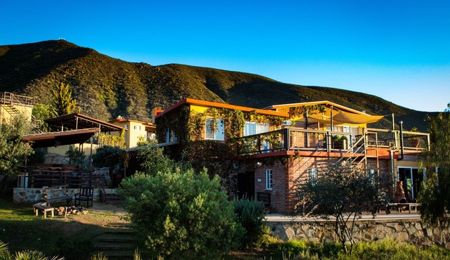 3 comfortable individuals cabins in a property with stunning views of the valley