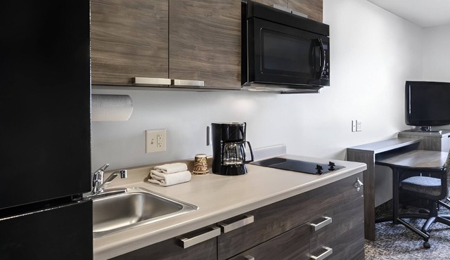 3 Extended-Stay Studios Near Historic Warhawk Air Museum and Lakeview Water Park