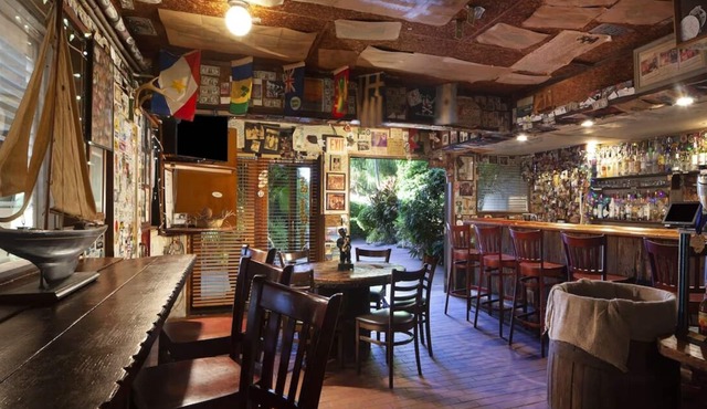 3 Island-Chic Rooms Offering Private White Sand Beach on Duval St. in Key West