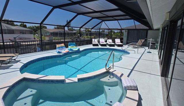 3 Miles from Beach! Beautiful Canal Home, 3 Bed/3 Bath, heated pool and spa