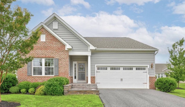 3 miles to Lewes Beach with fenced yard, game room and huge community pool!