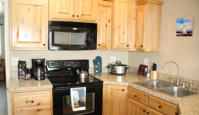 3 queen beds, 1 twin bed, 2 rooms, 1 and a half bath, self check-in, flexcation equipped