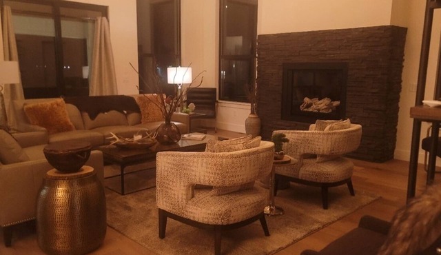 3 sided views of golf course, Rimrocks, hill, Bear Tooth and Prior Mountains.