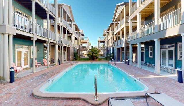 3-story, dog-friendly home with pool & balcony - walk to beach