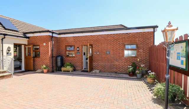 3 THE STABLES, with a garden in Ryde