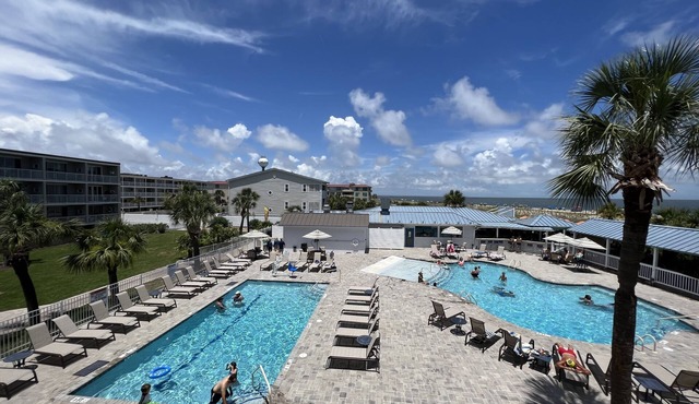 30 Steps to the Beach! Luxury Condo with Large wrap-around porch!