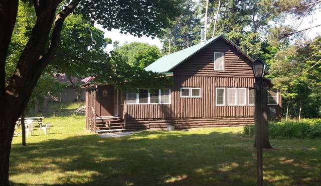 350 feet of private beach on Lake Michigan, 6 acres of privacy