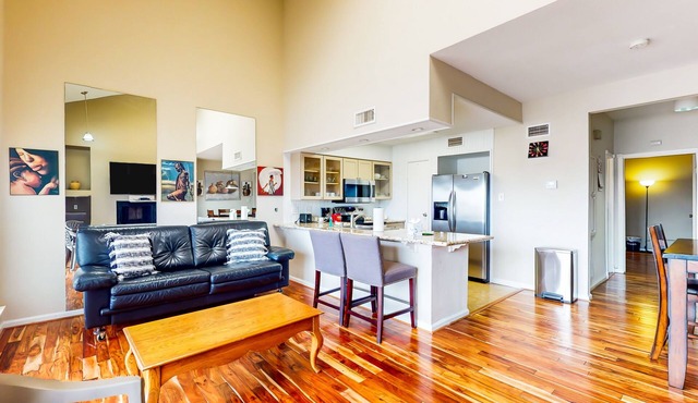 3rd-floor condo with water views, on-site pool, & private balcony