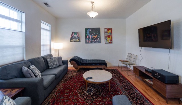 4 bd, 2 1/2 bath, on 3rd, 4 blocks from downtown, filled with art and antiques