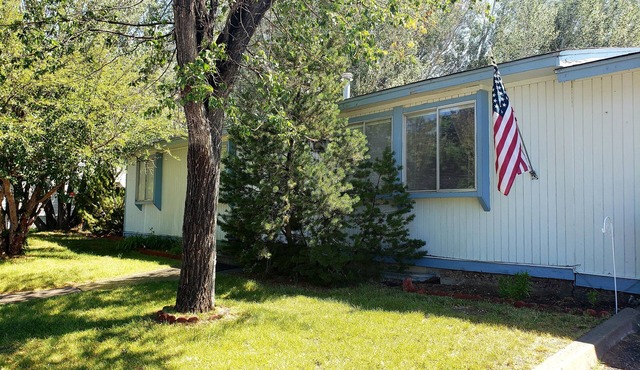 4 Bed 2 Bath Home. Great area. Yard and sun porch. Close to Shopping and park.