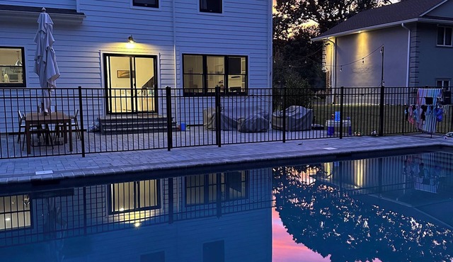 4-bed 3.5-bath house with fenced heated pool and hot tub, fire pit, kids swings