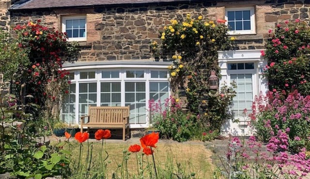 4 bed cottage with parking and views in Craster